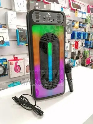 KTS-1555 Portable Rechargeable Wireless Speaker With Microphone