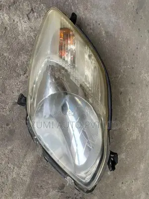 Toyota Vitz KSP90 R/Side moulding auto focus Head light