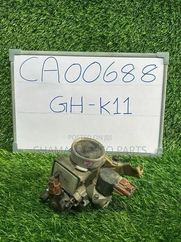 Nissan March (GH-K11) Throttle Body