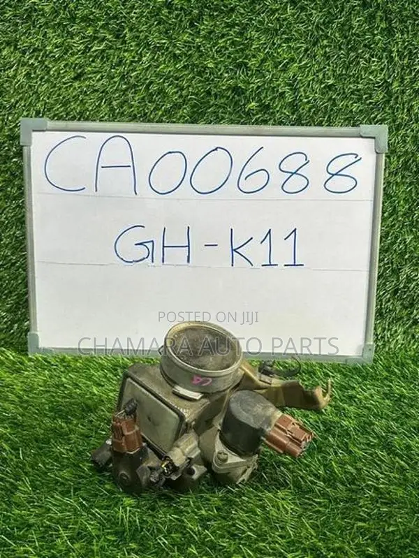 Nissan March (GH-K11) Throttle Body