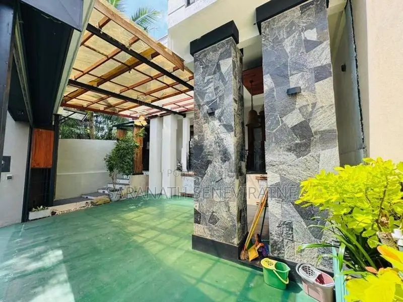 Modern House From Pannipitiya Facing a Beautiful Paddy Field