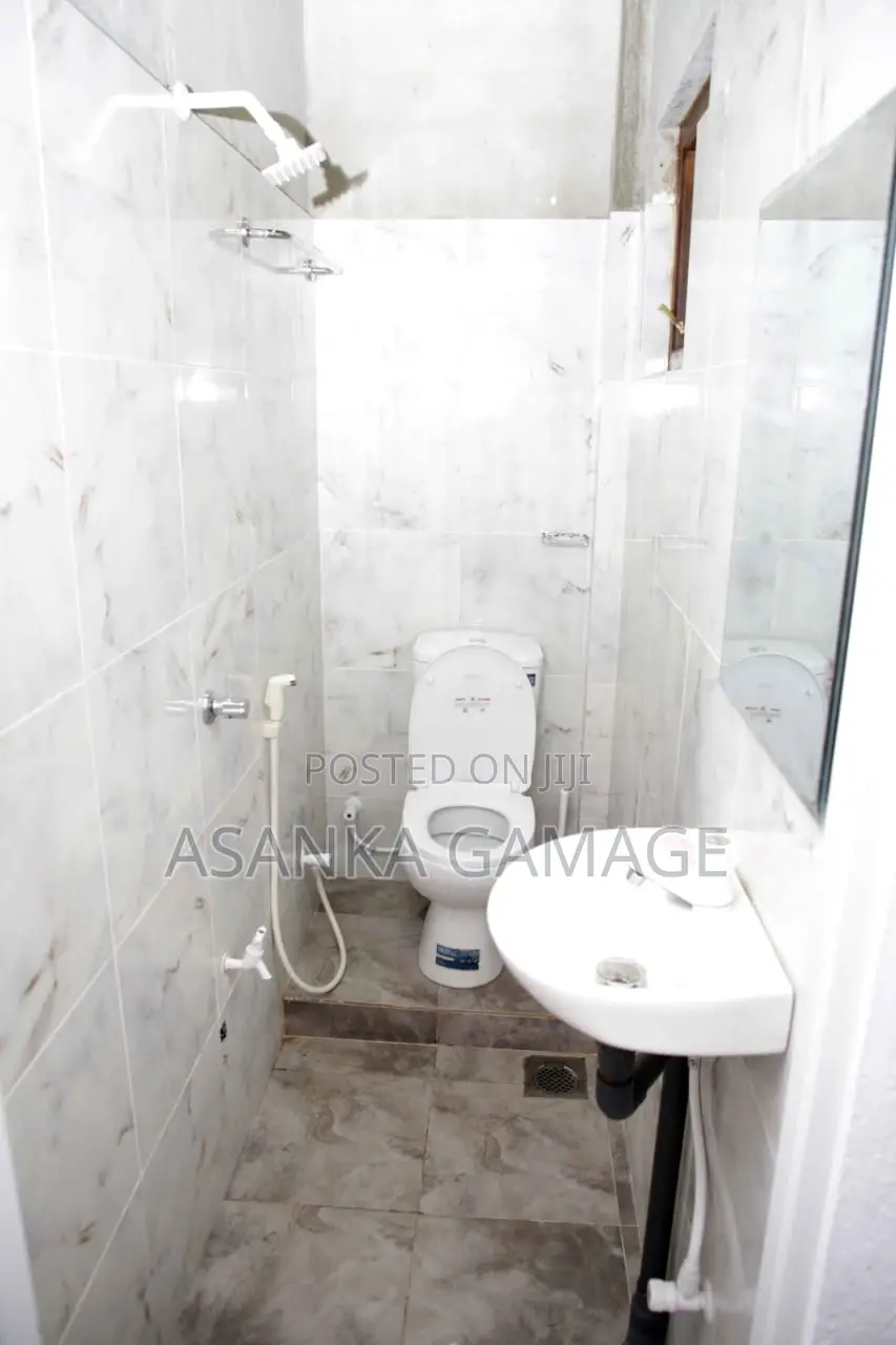 A Room With Two Beds. Small Kitchen. Attach Bathroom