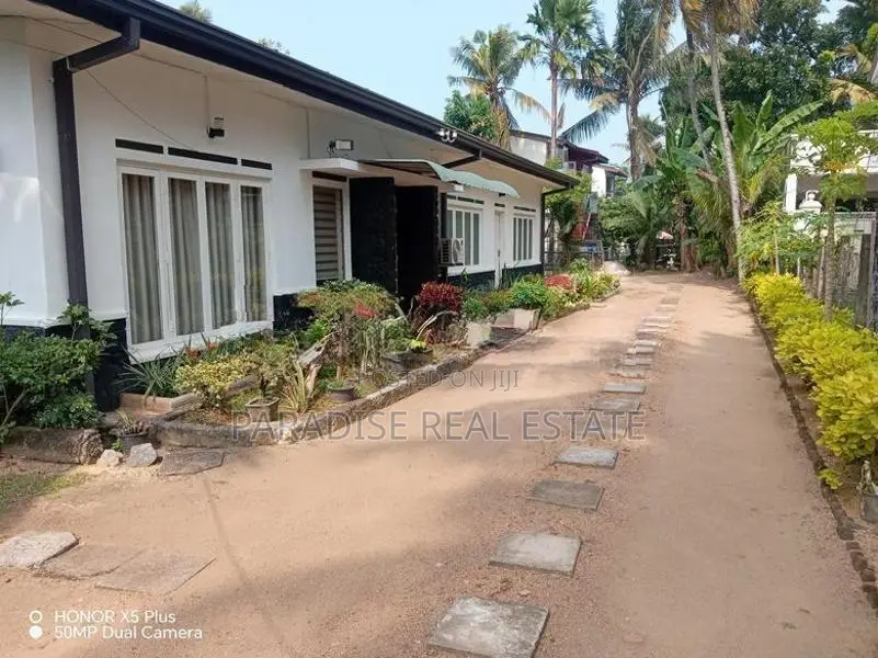 Land for Sale with Single Storey House