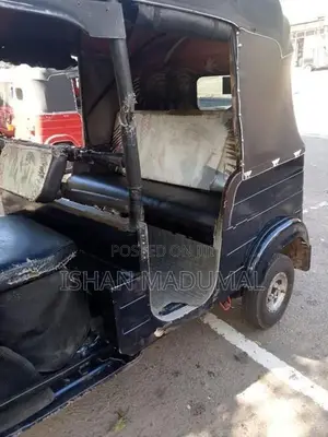 Bajaj RE 2013