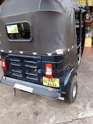 Bajaj RE 2013