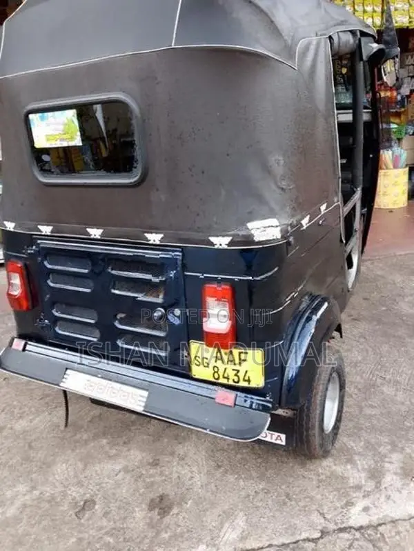Bajaj RE 2013