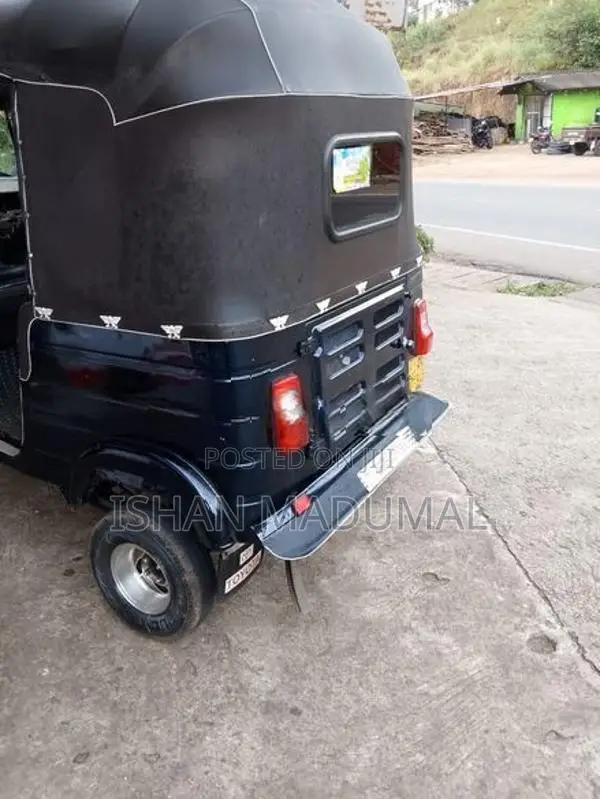 Bajaj RE 2013