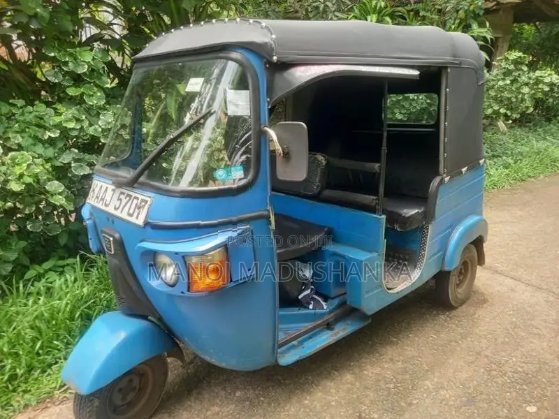 Bajaj RE 2013