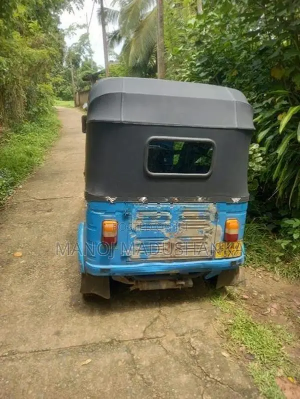 Bajaj RE 2013