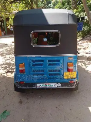 Bajaj RE 2014