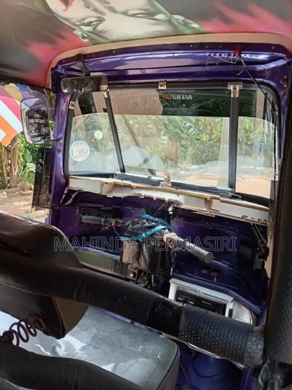 Bajaj RE 2003