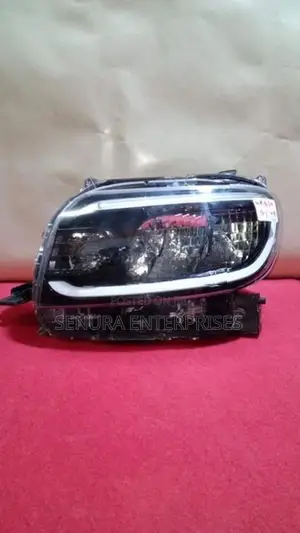 daihatsu tanto la 650 head light lh