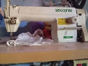 ‍Zoje Sewing Machine
