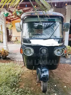 Bajaj RE 2013