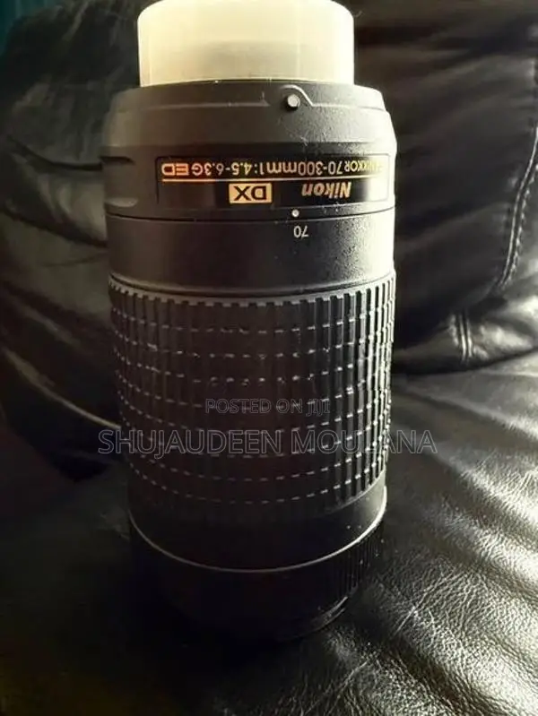Nikon D7100 + 18-55 50mm 70-300