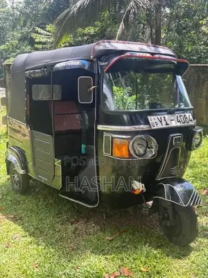 Bajaj RE 2011