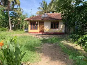 Land with House for Sale in Muwangala