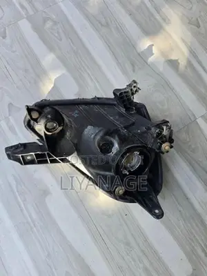 Daihatsu Mira LA300 Head lamp L