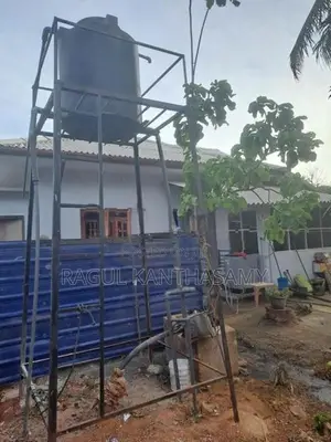 Water Tank with Iron Stand