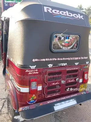 Bajaj RE 2014