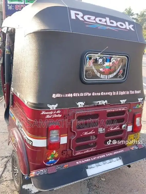 Bajaj RE 2014