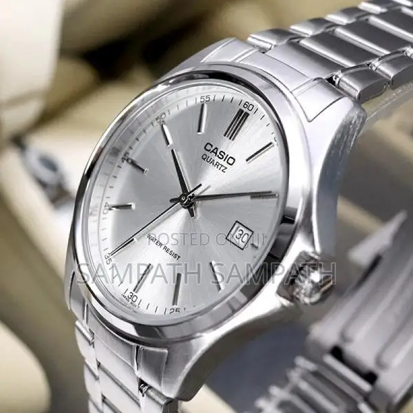 Silver Diale Casio MTP1239D Watch