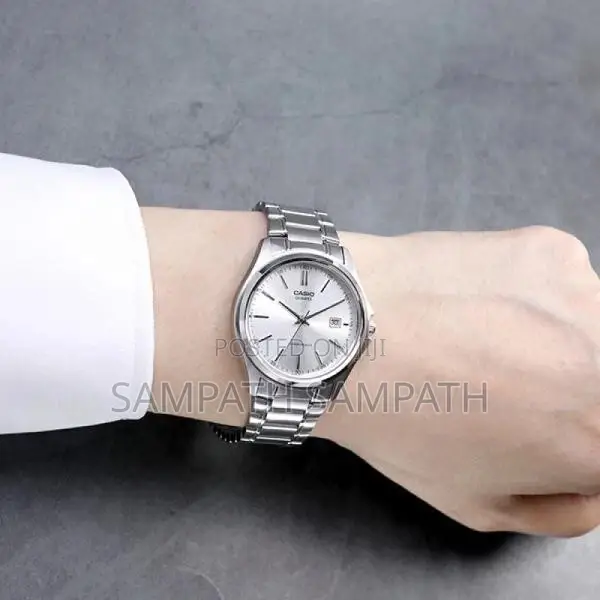 Silver Diale Casio MTP1239D Watch