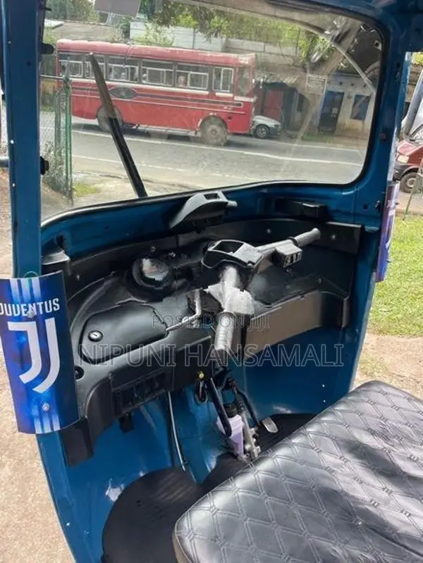 Bajaj RE 2014