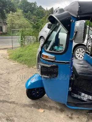 Bajaj RE 2014