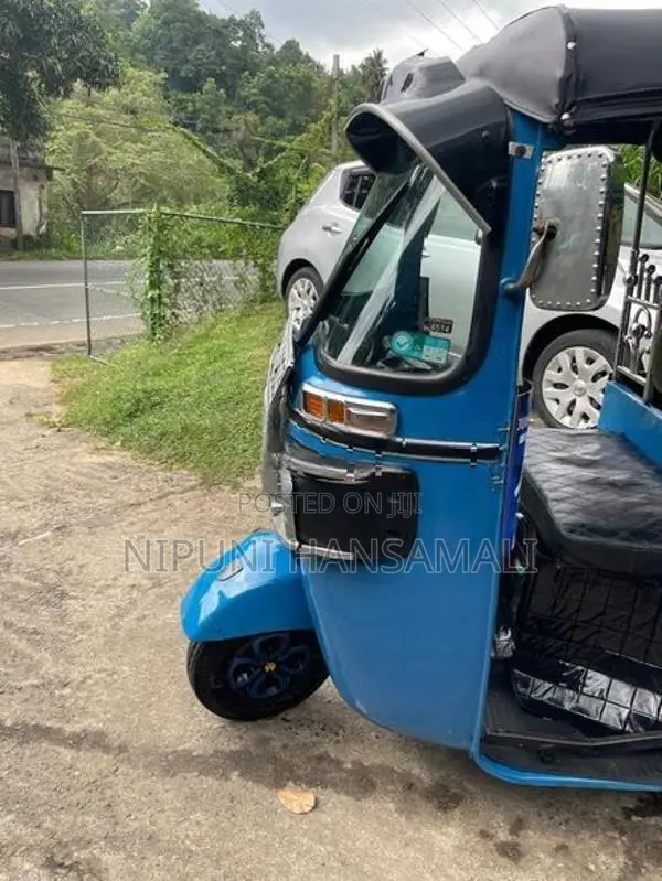 Bajaj RE 2014