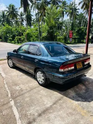 Nissan FB15 EX Saloon 2000 Car (Used)