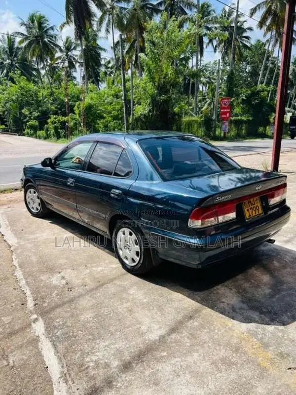 Nissan FB15 EX Saloon 2000 Car (Used)