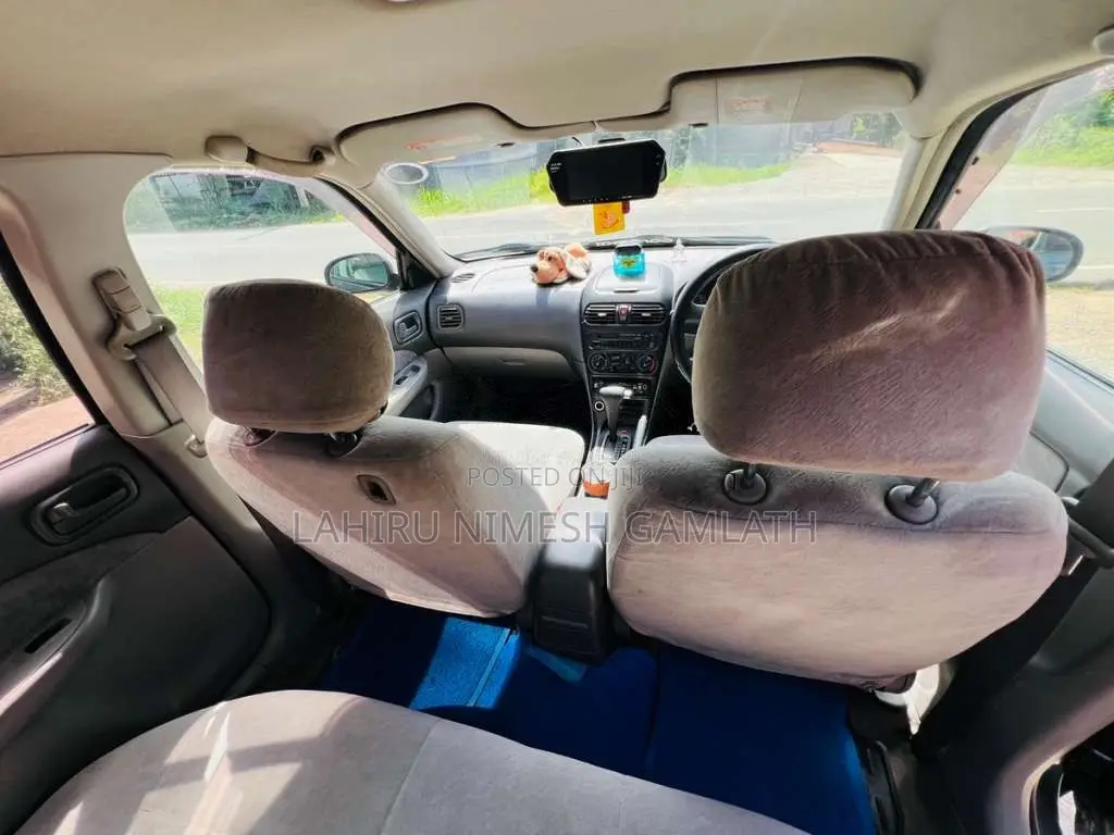 Nissan FB15 EX Saloon 2000 Car (Used)