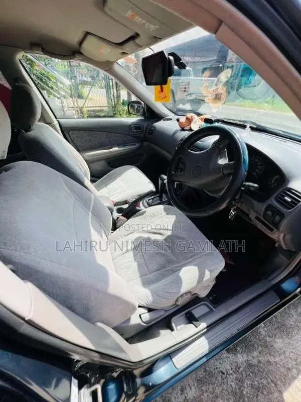 Nissan FB15 EX Saloon 2000 Car (Used)