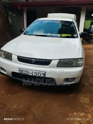 Mazda Familia 1997 Car (Used)