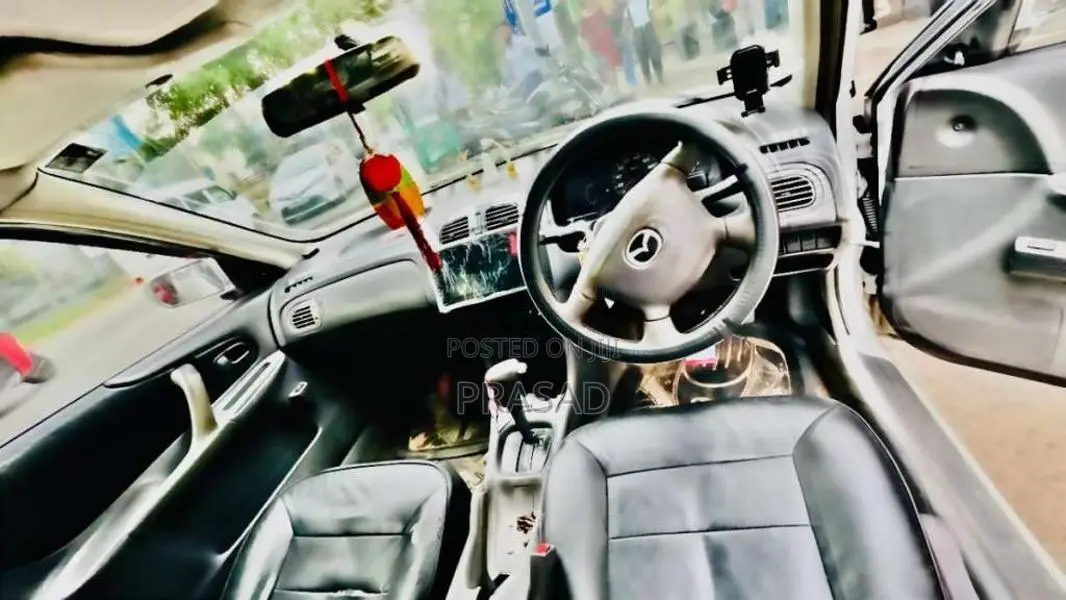 Mazda Familia 2004 Car (Used)