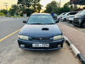 Mazda 323 1998 Car (Used)