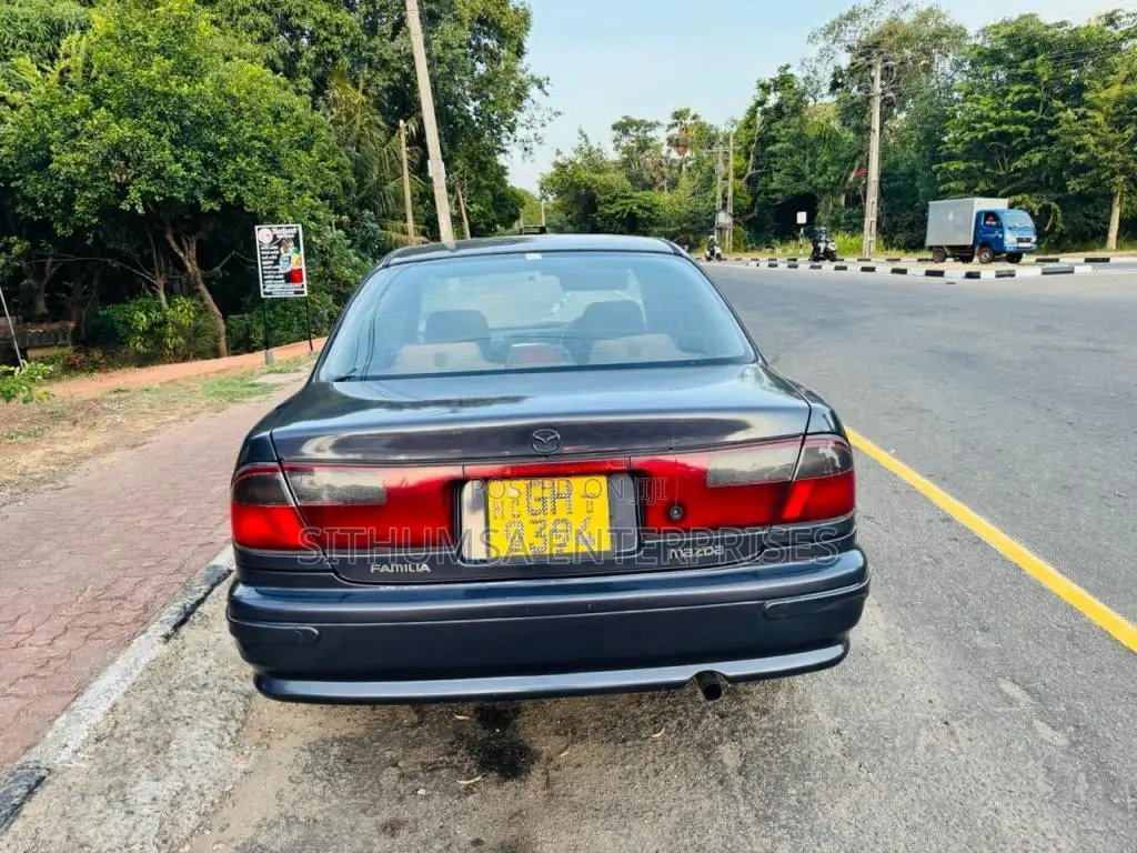 Mazda 323 1998 Car (Used)