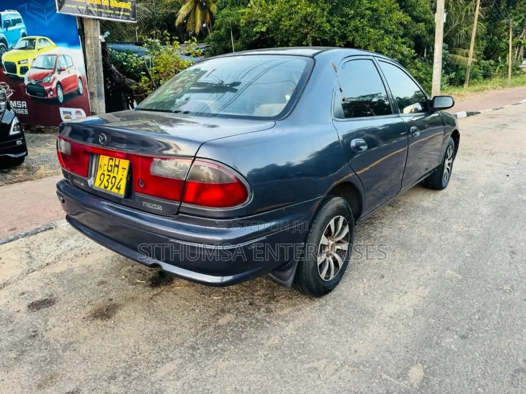Mazda 323 1998 Car (Used)