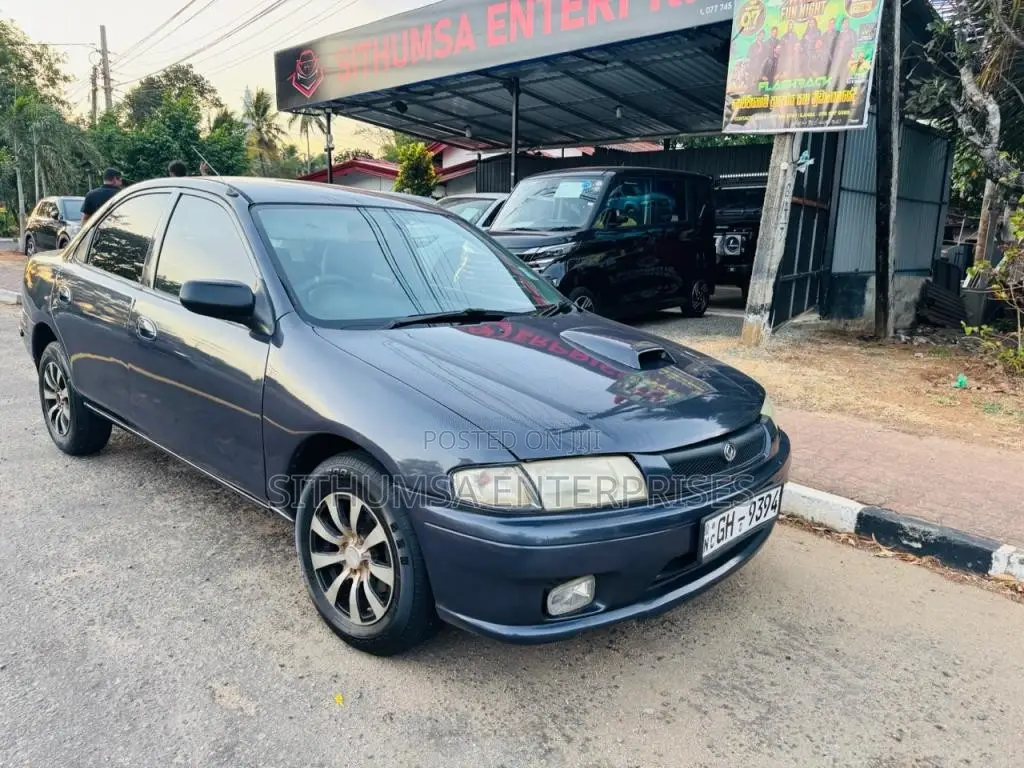 Mazda 323 1998 Car (Used)