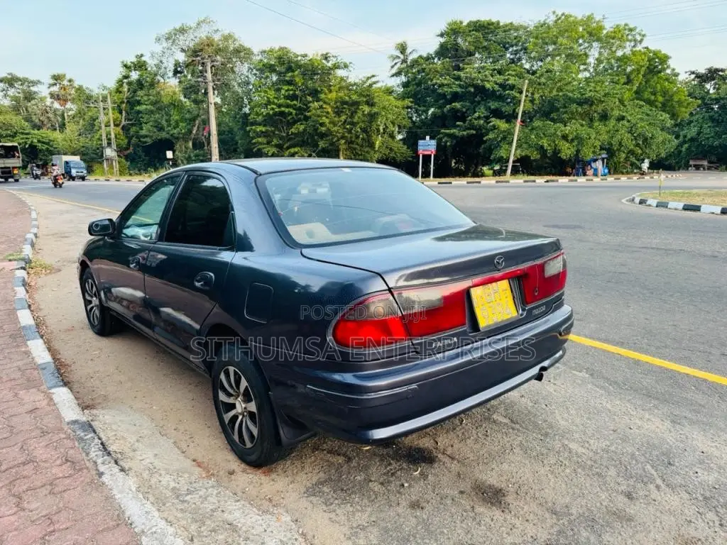 Mazda 323 1998 Car (Used)