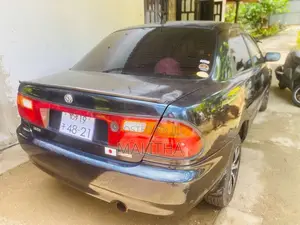 Mazda Familia Butterfly 323 1995 Car (Used)