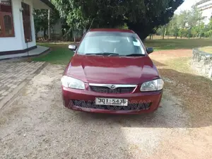 Mazda 323 1999 Car (Used)