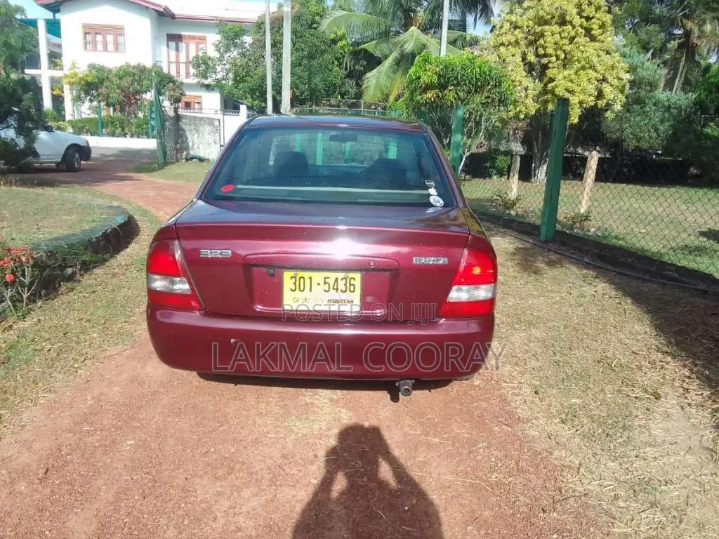 Mazda 323 1999 Car (Used)