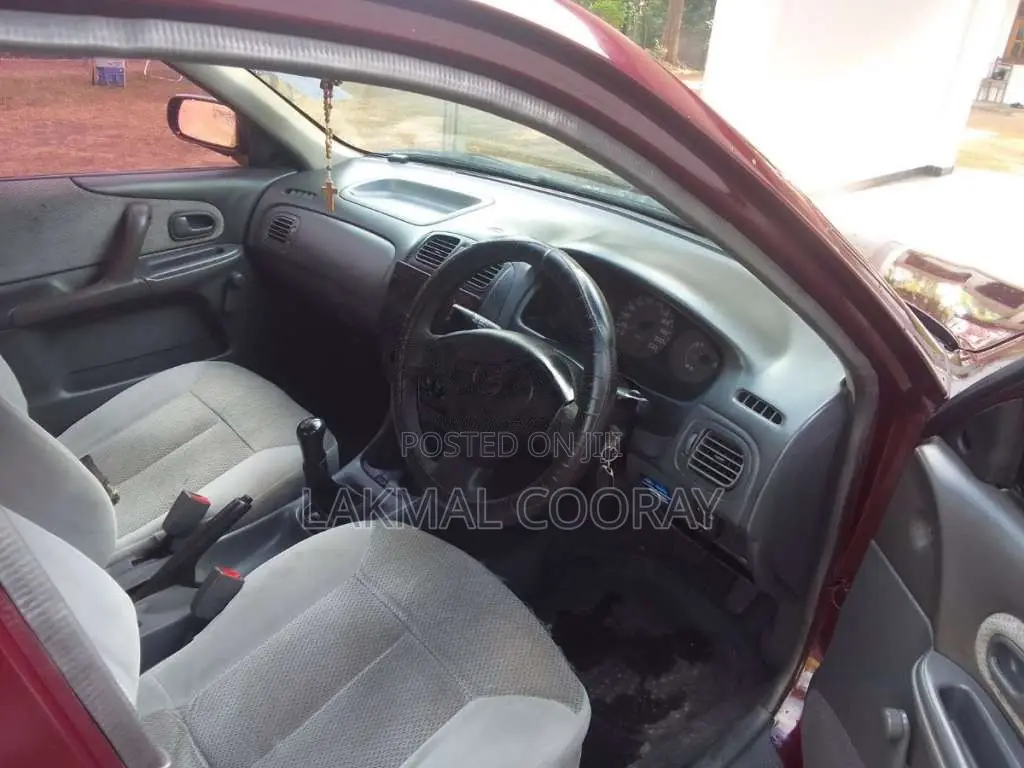 Mazda 323 1999 Car (Used)