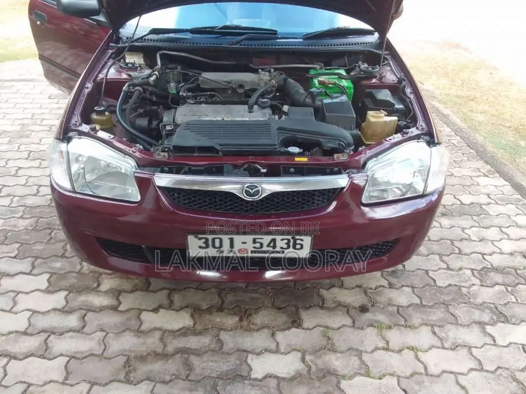 Mazda 323 1999 Car (Used)
