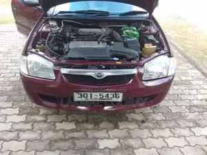 Mazda 323 1999 Car (Used)