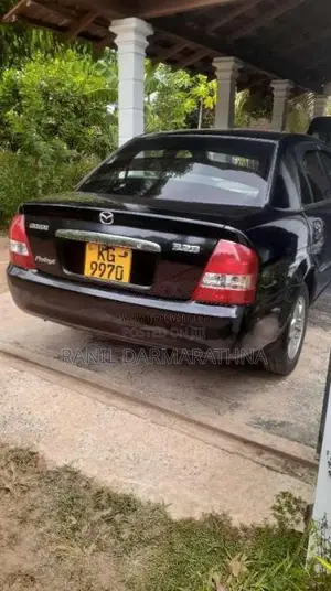 Mazda 323 2003 Car (Used)