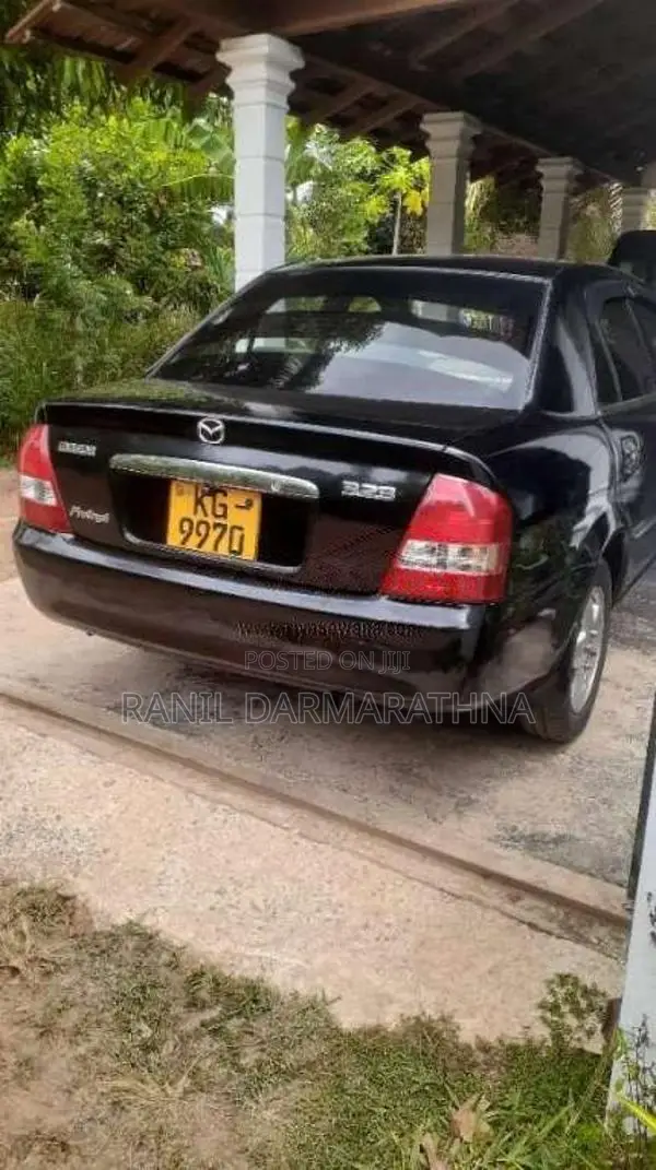 Mazda 323 2003 Car (Used)