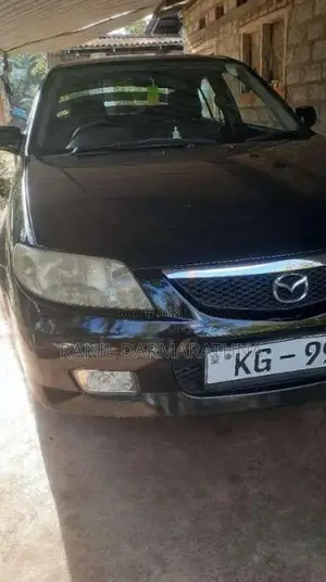Mazda 323 2003 Car (Used)
